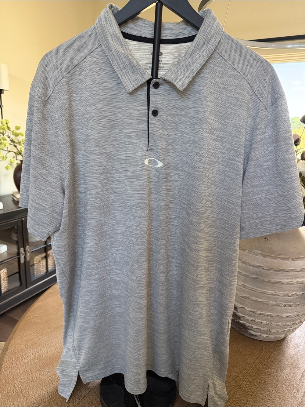 Oakley Men's Light Gray & White Polo with Subtle Logo.